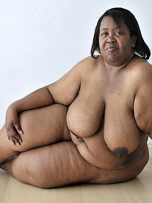 mature black woman naked flaunts her pussy