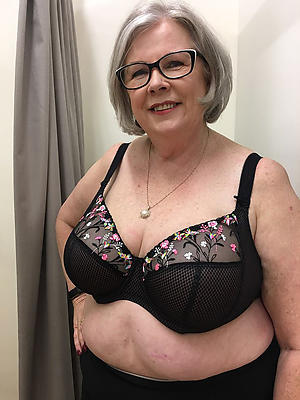 mature on every side glasses posing in one's birthday suit